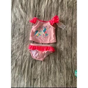 Girls size 6 to 9 months pink two piece bathing suit‎ with unicorn